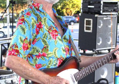 James playing Fender Telecaster wearing Hawaiian shirt the band silver